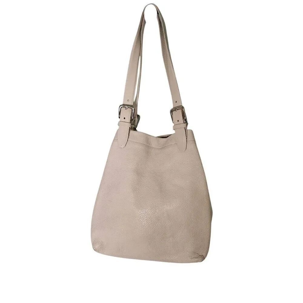 Oval Room cream colored leather shoulder bag made in Italy.